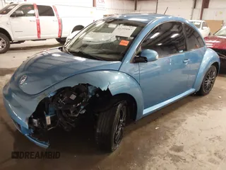 2010 Volkswagen New Beetle Coupe with VIN 3VWPW3AG4AM003893, listed as a IAAI auction lot 41255087 with 192,128 mi miles. Bid and sale history available at carsss.com. Image 2.