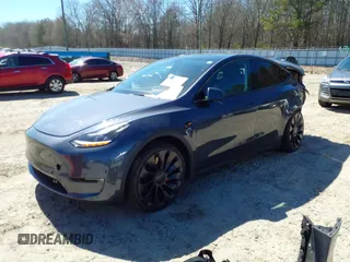 2022 Tesla Model Y Performance with VIN 7SAYGDEF9NF544205, listed as a IAAI auction lot 41825453 with 33,039 mi miles and . Bid and sale history available at DreamBid. Image 2.