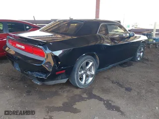 2013 Dodge Challenger SXT with VIN 2C3CDYAG1DH629087, listed as a IAAI auction lot 41993728 with 226,948 mi miles. Bid and sale history available at carsss.com. Image 4.