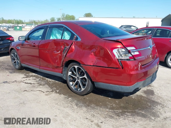 2014 Ford Taurus SEL with VIN 1FAHP2E81EG116790, listed as a IAAI auction lot 41995975 with 131,179 mi miles. Bid and sale history available at carsss.com. Image 3.