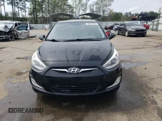 2014 Hyundai Accent SE z VIN KMHCU5AE2EU164130, wystawiony jako Copart lot #50972055 z przebiegiem 113 834 mil mil oraz Szkoda całkowita • Salvage title. Historia ofert i sprzedaży dostępna na DreamBid. Obrazek 5.