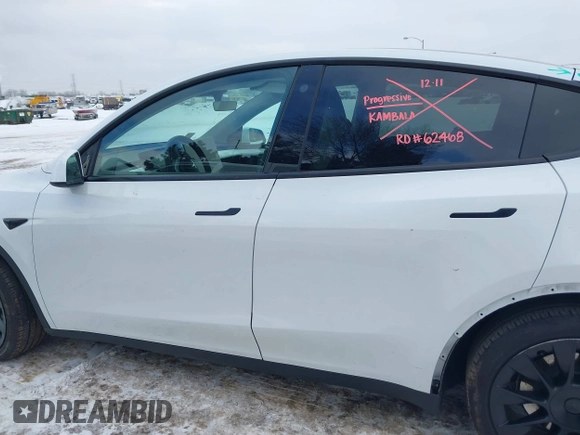 2023 Tesla Model Y Long Range with VIN 7SAYGAEE8PF706706, listed as a IAAI auction lot 41297340 with 24,428 mi miles and . Bid and sale history available at DreamBid. Image 15.