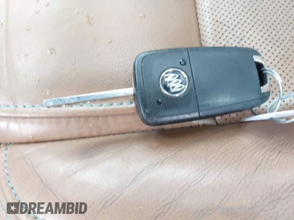 2014 Buick LaCrosse Premium II with VIN 1G4GF5G39EF305460, listed as a IAAI auction lot 41951229 with 127,188 mi miles and . Bid and sale history available at DreamBid. Image 11.