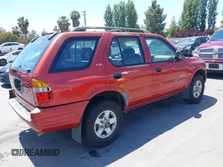 1999 Isuzu Rodeo S z VIN 4S2CK58W4X4362837, wystawiony jako IAAI lot #42403621 z przebiegiem 177 690 mil mil oraz . Historia ofert i sprzedaży dostępna na DreamBid. Obrazek 4.
