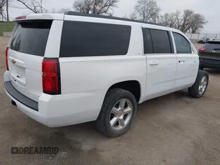 2015 Chevrolet Suburban LT with VIN 1GNSKJKC7FR547276, listed as a IAAI auction lot 42041289 with 189,075 mi miles and . Bid and sale history available at DreamBid. Image 4.