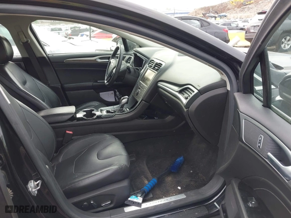 2015 Ford Fusion Titanium Hybrid with VIN 3FA6P0RU6FR299374, listed as a IAAI auction lot 41576007 with 191,285 mi miles. Bid and sale history available at carsss.com. Image 5.