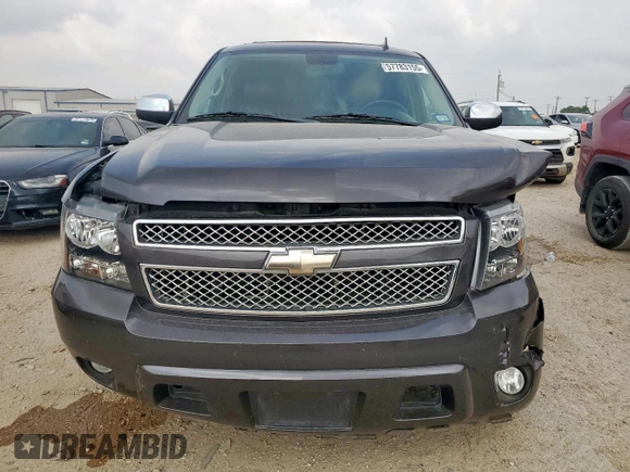 2011 Chevrolet Tahoe LT z VIN 1GNSCBE05BR155119, wystawiony jako Copart lot #57783155 z przebiegiem 142 297 mil mil oraz Szkoda całkowita • Salvage title. Historia ofert i sprzedaży dostępna na DreamBid. Obrazek 5.