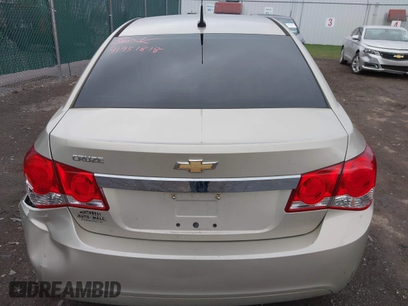 2014 Chevrolet Cruze LS with VIN 1G1PA5SG1E7391492, listed as a IAAI auction lot 41951818 with 103,285 mi miles and . Bid and sale history available at DreamBid. Image 16.