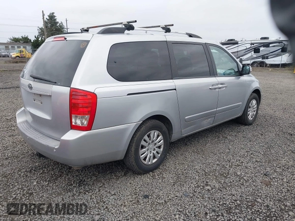 2011 Kia Sedona LX with VIN KNDMG4C7XB6363483, listed as a IAAI auction lot 41884439 with 243,076 mi miles. Bid and sale history available at carsss.com. Image 4.