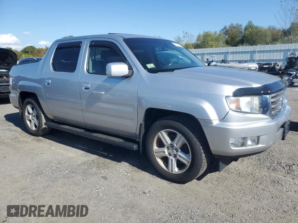 2012 Honda Ridgeline RTL with VIN 5FPYK1F55CB452206, listed as a Copart auction lot 74694204 with 128,226 mi miles and Clean Title. Bid and sale history available at carsss.com. Image 4.