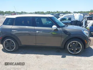 2012 MINI Countryman S z VIN WMWZC3C55CWL83472, wystawiony jako IAAI lot #42289981 z przebiegiem 101 812 mil mil oraz . Historia ofert i sprzedaży dostępna na DreamBid. Obrazek 13.