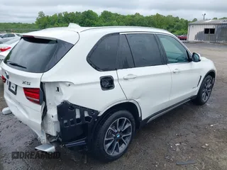 2018 BMW X5 xDrive35i z VIN 5UXKR0C50JL075205, wystawiony jako IAAI lot #42231107 z przebiegiem 38 412 mil mil oraz . Historia ofert i sprzedaży dostępna na DreamBid. Obrazek 4.