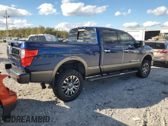 2016 Nissan Titan XD Platinum Reserve with VIN 1N6BA1F46GN512586, listed as a Copart auction lot 82406194 with 115,666 mi miles and Salvage Title. Bid and sale history available at carsss.com. Image 4.