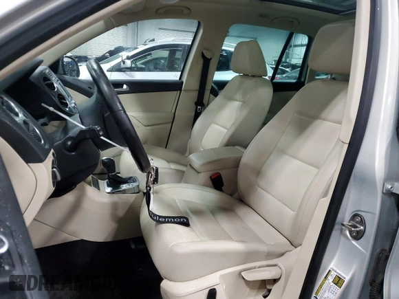 2012 Volkswagen Tiguan S with VIN WVGBV7AX3CW512668, listed as a Copart auction lot 42055975 with 106,148 mi miles and Salvage Title. Bid and sale history available at DreamBid. Image 7.