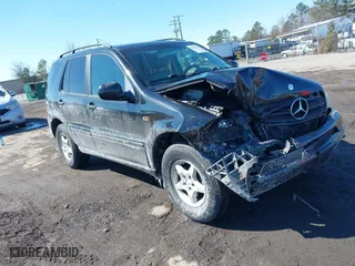 2000 Mercedes-Benz M-Class with VIN 4JGAB54E5YA172706, listed as a IAAI auction lot 41652197 with 221,907 mi miles. Bid and sale history available at carsss.com. Image 1.