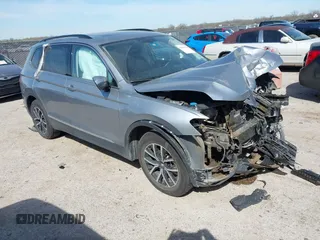2021 Volkswagen Tiguan SE with VIN 3VV3B7AXXMM116774, listed as a IAAI auction lot 41868796 with Not Provided miles and . Bid and sale history available at DreamBid. Image 1.