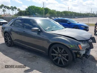 2014 Chrysler 300 with VIN 2C3CCABG8EH272758, listed as a IAAI auction lot 41709156 with 172,142 mi miles. Bid and sale history available at carsss.com. Image 1.