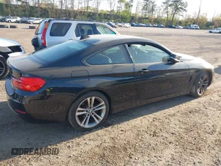 2014 BMW 4 Series 428i xDrive with VIN WBA3N9C55EF721295, listed as a IAAI auction lot 42139256 with 85,472 mi miles and . Bid and sale history available at carsss.com. Image 4.