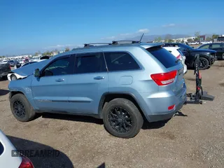 2012 Jeep Grand Cherokee Limited z VIN 1C4RJFBTXCC341813, wystawiony jako IAAI lot #41791662 z przebiegiem 120 811 mil mil oraz . Historia ofert i sprzedaży dostępna na DreamBid. Obrazek 15.