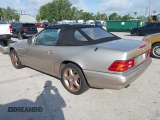 2000 Mercedes-Benz SL 500 z VIN WDBFA68F6YF194611, wystawiony jako IAAI lot #42362699 z przebiegiem 120 647 mil mil oraz . Historia ofert i sprzedaży dostępna na DreamBid. Obrazek 3.