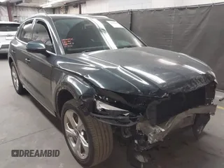 2021 Audi Q5 Premium Plus z VIN WA1BAAFY6M2130300, wystawiony jako IAAI lot #42250661 z przebiegiem 49 147 mil mil oraz . Historia ofert i sprzedaży dostępna na DreamBid. Obrazek 1.