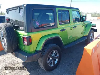 2019 Jeep Wrangler Unlimited Sahara with VIN 1C4HJXEN1KW592876, listed as a IAAI auction lot 42039474 with 66,506 mi miles and . Bid and sale history available at DreamBid. Image 4.
