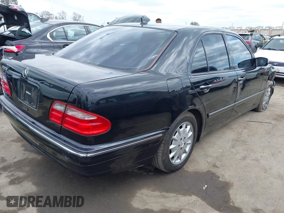 2001 Mercedes-Benz E 320 with VIN WDBJF65J91B363439, listed as a IAAI auction lot 42058536 with 61,272 mi miles and . Bid and sale history available at DreamBid. Image 4.