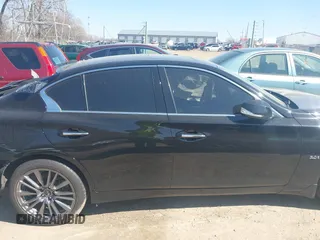2019 Infiniti Q50 3.0t LUXE with VIN JN1EV7AR6KM591124, listed as a IAAI auction lot 41683686 with 66,529 mi miles. Bid and sale history available at carsss.com. Image 13.