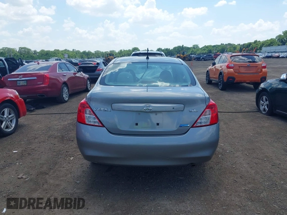 2012 Nissan Versa SV with VIN 3N1CN7APXCL812936, listed as a IAAI auction lot 42533280 with 78,071 mi miles and . Bid and sale history available at DreamBid. Image 17.