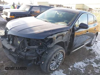 2016 Lincoln MKX Select with VIN 2LMTJ8KR5GBL55338, listed as a IAAI auction lot 41431389 with 93,181 mi miles. Bid and sale history available at carsss.com. Image 2.