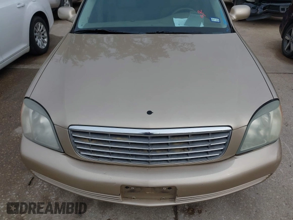 2005 Cadillac DeVille z VIN 1G6KD54Y25U129354, wystawiony jako IAAI lot #41930408 z przebiegiem 121 391 mil mil oraz . Historia ofert i sprzedaży dostępna na DreamBid. Obrazek 6.