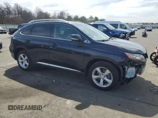 2010 Lexus RX 350 with VIN 2T2BK1BAXAC021813, listed as a Copart auction lot 52675365 with 221,947 mi miles and Salvage Title. Bid and sale history available at DreamBid. Image 4.