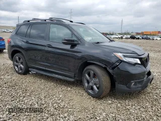 2021 Honda Passport Touring z VIN 5FNYF8H91MB009476, wystawiony jako Copart lot #52449015 z przebiegiem 42 848 mil mil oraz Szkoda całkowita • Salvage title. Historia ofert i sprzedaży dostępna na DreamBid. Obrazek 4.