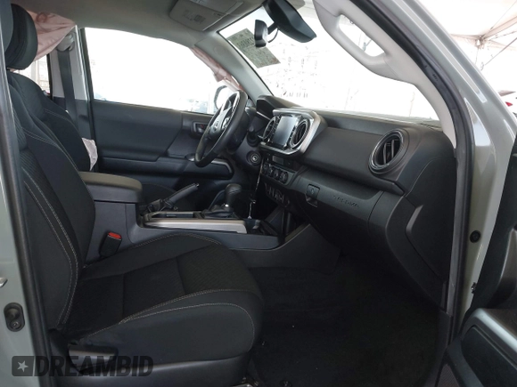 2022 Toyota Tacoma SR with VIN 3TMCZ5ANXNM479025, listed as a IAAI auction lot 42280363 with 29,650 mi miles and . Bid and sale history available at DreamBid. Image 5.