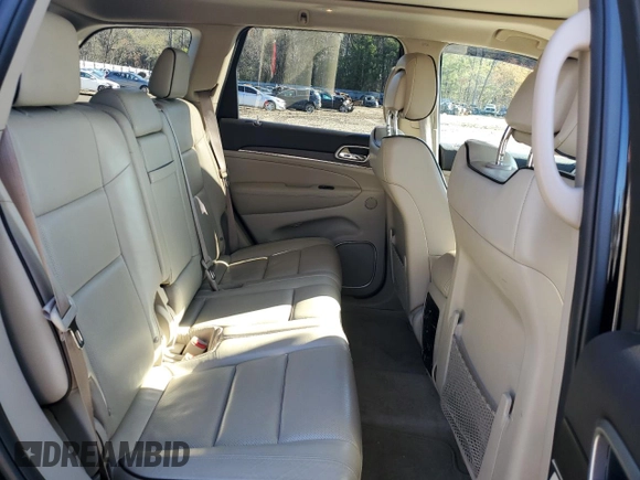 2017 Jeep Grand Cherokee Overland with VIN 1C4RJFCT3HC755960, listed as a Copart auction lot 52268895 with 99,998 mi miles and Salvage title. Bid and sale history available at DreamBid. Image 11.