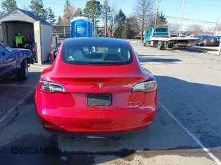 2020 Tesla Model 3 Long Range with VIN 5YJ3E1EB4LF668470, listed as a IAAI auction lot 41743651 with 151,957 mi miles. Bid and sale history available at carsss.com. Image 16.