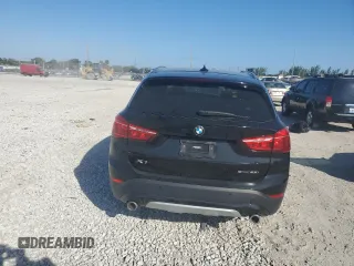 2022 BMW X1 sDrive28i with VIN WBXJG7C03N5U52669, listed as a Copart auction lot 87806305 with 27,609 mi miles and Salvage Title. Bid and sale history available at carsss.com. Image 6.