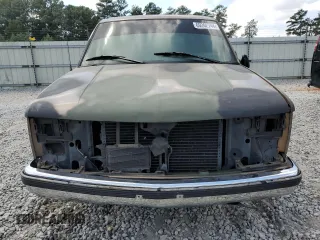 1996 GMC Suburban z VIN 3GKEC16R1TG516669, wystawiony jako Copart lot #69262744 z przebiegiem Nie podano mil oraz Szkoda całkowita • Salvage title. Historia ofert i sprzedaży dostępna na DreamBid. Obrazek 5.