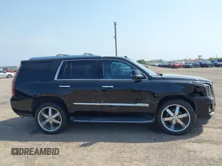 2017 Cadillac Escalade z VIN 1GYS3AKJ4HR338806, wystawiony jako IAAI lot #41941193 z przebiegiem 119 865 mil mil oraz . Historia ofert i sprzedaży dostępna na DreamBid. Obrazek 13.