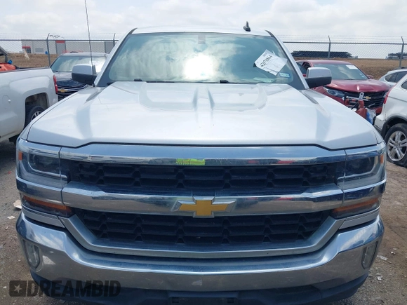 2018 Chevrolet Silverado 1500 LT with VIN 1GCRCREHXJZ336480, listed as a IAAI auction lot 42078864 with 140,366 mi miles and . Bid and sale history available at DreamBid. Image 12.