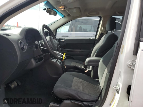 2011 Jeep Compass with VIN 1J4NT1FB8BD138161, listed as a Copart auction lot 73679894 with 199,735 mi miles and Salvage Title. Bid and sale history available at carsss.com. Image 7.