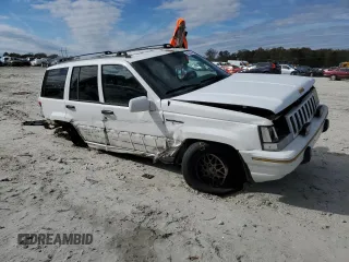 1995 Jeep Grand Cherokee Limited with VIN 1J4GZ78Y2SC788413, listed as a Copart auction lot 80297444 with 309,566 mi miles and Salvage Title. Bid and sale history available at carsss.com. Image 4.