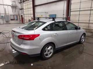 2015 Ford Focus SE with VIN 1FADP3F28FL231684, listed as a IAAI auction lot 41914284 with 100,195 mi miles. Bid and sale history available at carsss.com. Image 4.