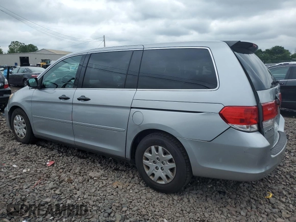 2010 Honda Odyssey LX with VIN 5FNRL3H2XAB059078, listed as a Copart auction lot 61144895 with 116,724 mi miles and Salvage title. Bid and sale history available at DreamBid. Image 2.