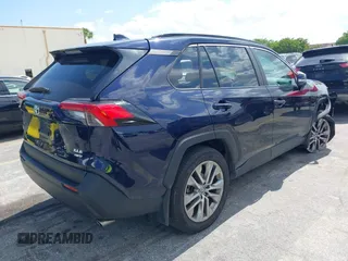 2024 Toyota RAV4 XLE Premium with VIN 2T3A1RFV4RW411614, listed as a IAAI auction lot 42295365 with 35,404 mi miles and . Bid and sale history available at DreamBid. Image 4.