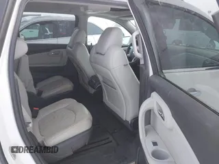 2012 Chevrolet Traverse LTZ z VIN 1GNKVLED6CJ289589, wystawiony jako IAAI lot #41226374 z przebiegiem 122 515 mil mil oraz . Historia ofert i sprzedaży dostępna na DreamBid. Obrazek 8.