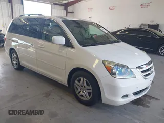 2005 Honda Odyssey EX with VIN 5FNRL38415B010150, listed as a IAAI auction lot 42844859 with 174,421 mi miles and . Bid and sale history available at DreamBid. Image 1.