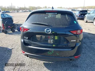 2019 Mazda CX-5 Grand Touring with VIN JM3KFBDM7K0525650, listed as a IAAI auction lot 42032757 with 65,530 mi miles and . Bid and sale history available at DreamBid. Image 17.
