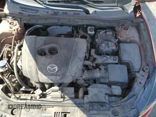 2018 Mazda 3 Touring z VIN 3MZBN1L3XJM170349, wystawiony jako Copart lot #55283645 z przebiegiem 167 930 mil mil oraz Szkoda całkowita • Salvage title. Historia ofert i sprzedaży dostępna na DreamBid. Obrazek 11.
