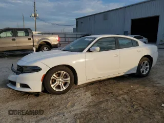 2019 Dodge Charger SXT z VIN 2C3CDXBG8KH707287, wystawiony jako Copart lot #43718475 z przebiegiem 103 988 mil mil oraz Szkoda całkowita • Salvage title. Historia ofert i sprzedaży dostępna na DreamBid. Obrazek 1.